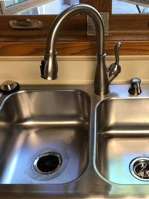 Kitchen Sink Installation by Reich's Plumbing and Heating